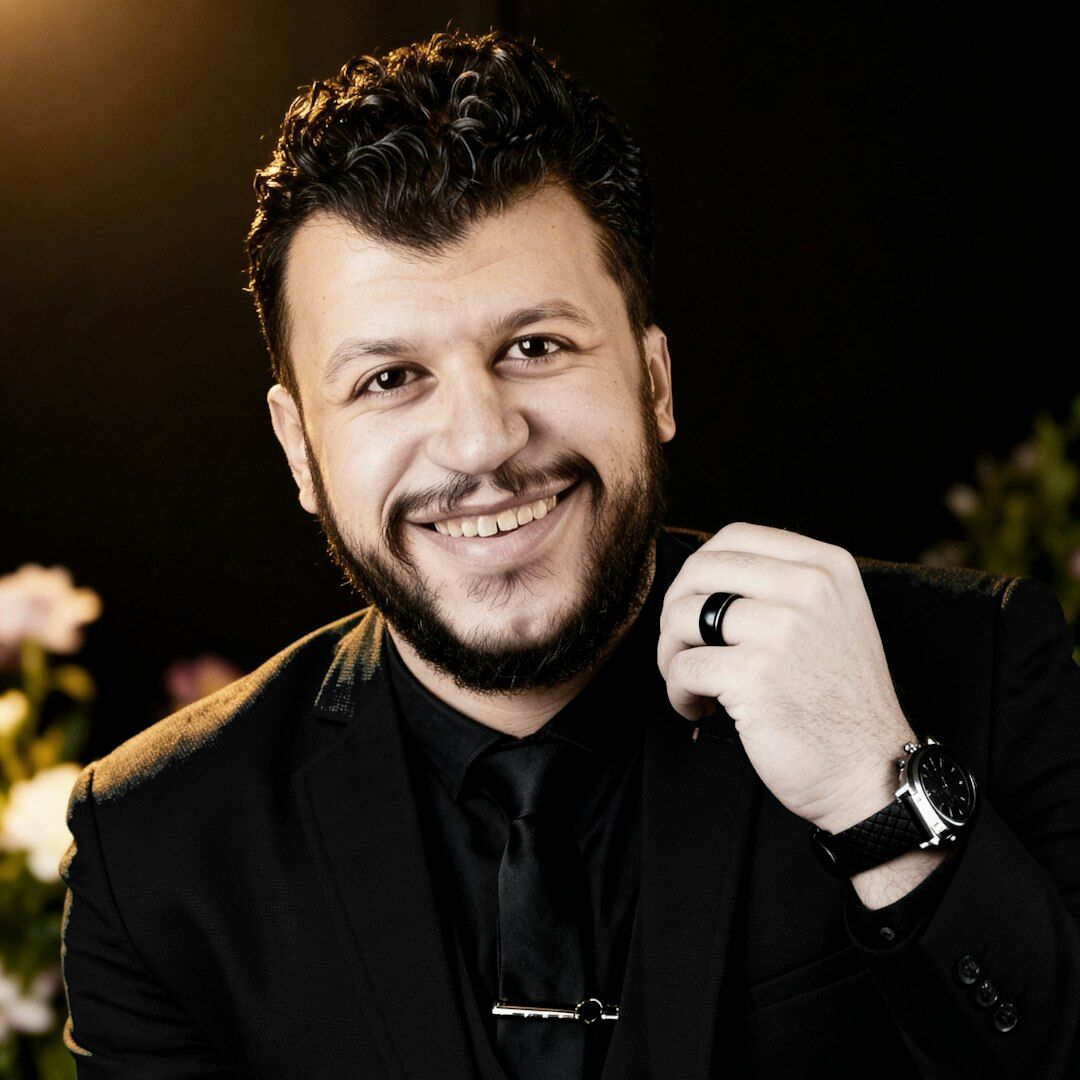 Professional portrait of male event director in business attire