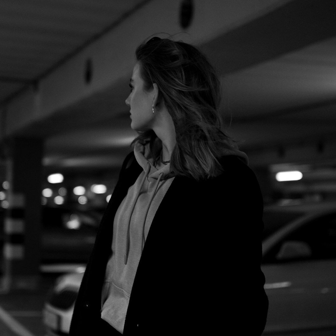 Professional portrait of female conference producer in blazer